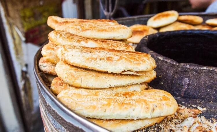 炉子烤的烧饼热量(烧饼烤炉多少钱一个)